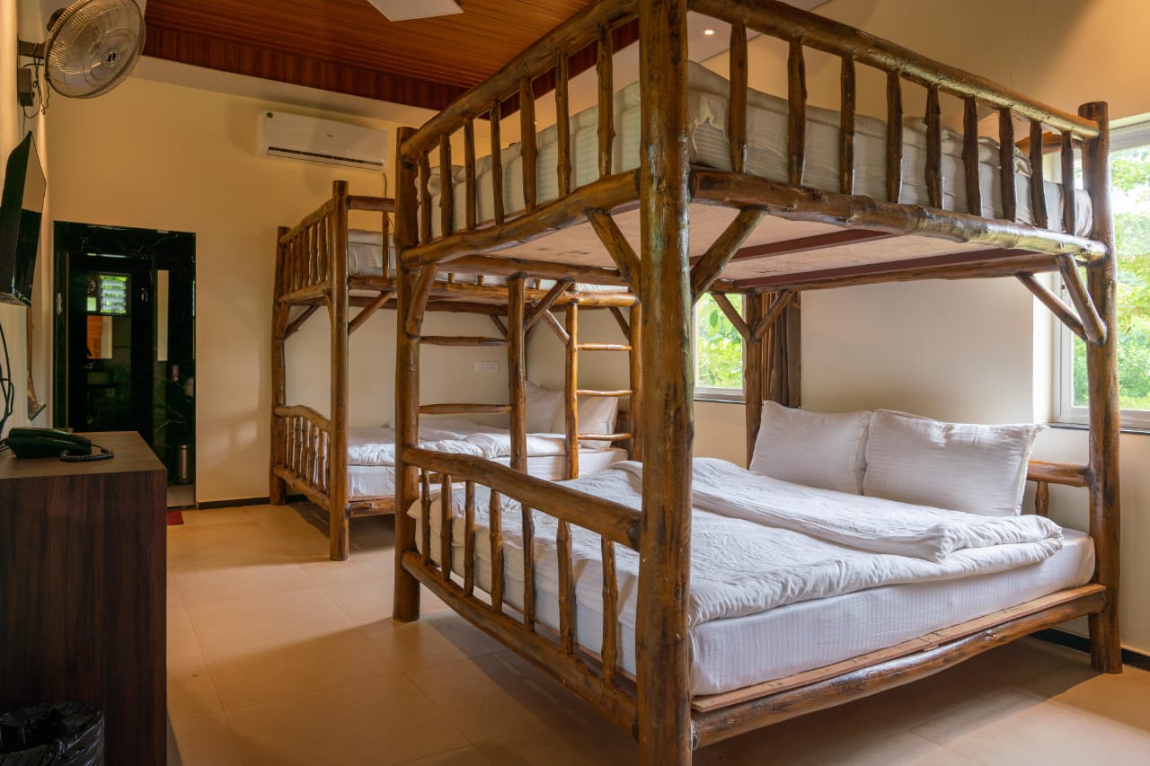 Spacious dormitory interior with privacy curtains