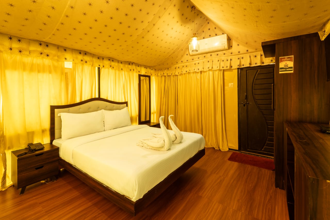 Elegant interior of Maharaja tent with four-poster bed
